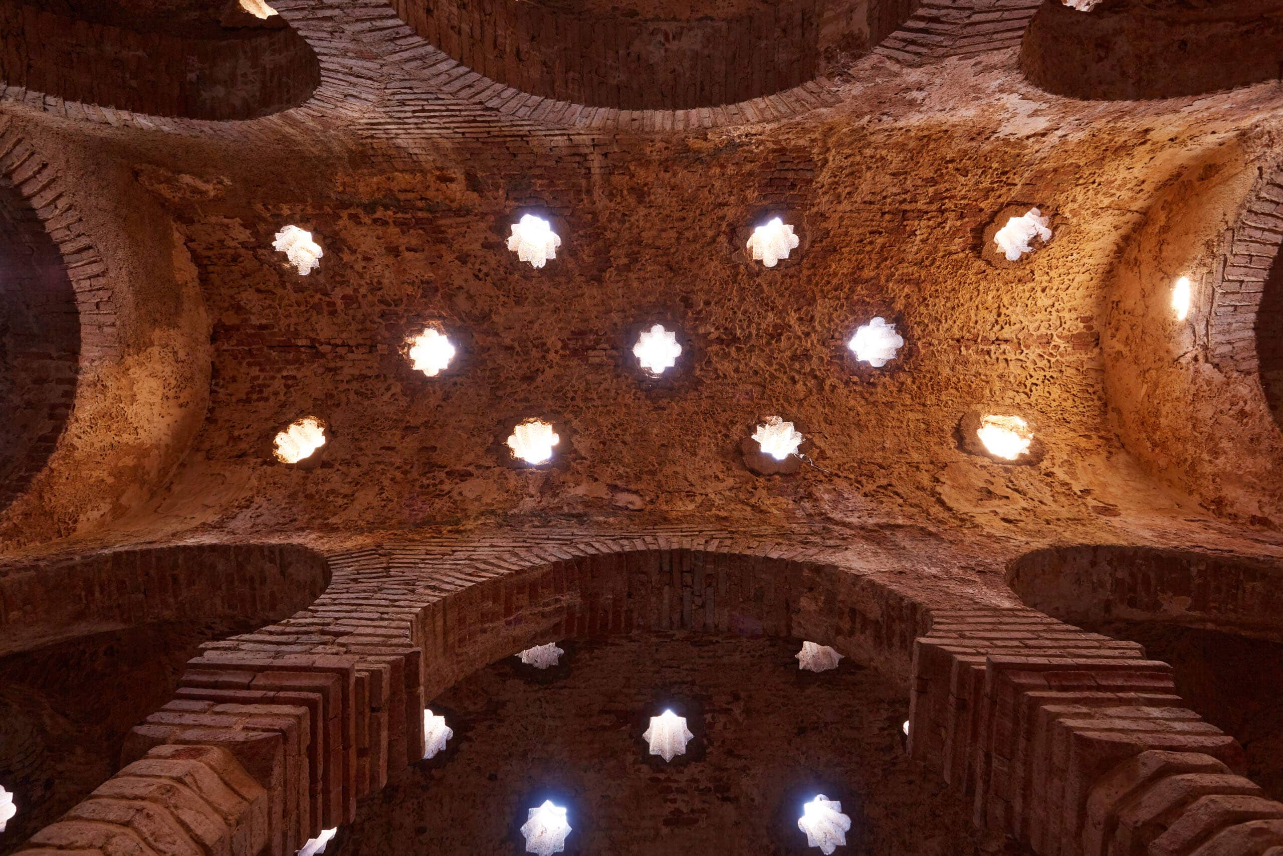 the ceiling of the warm room in the arab baths