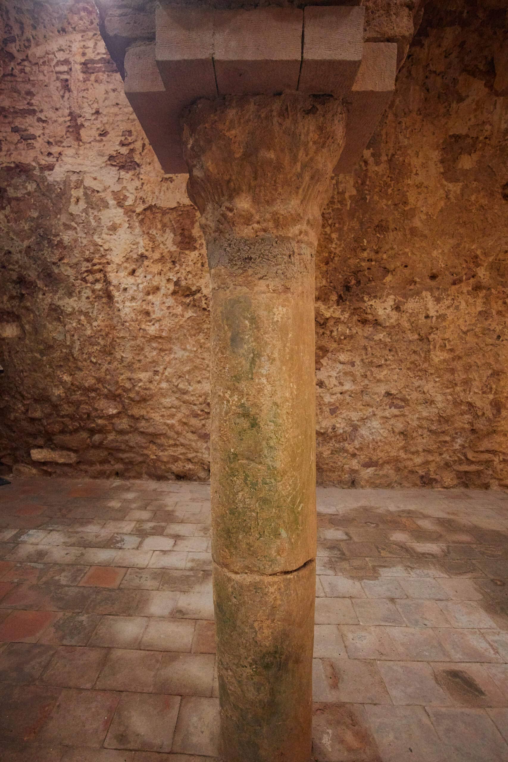 a roman pillar in the warm room of the baths