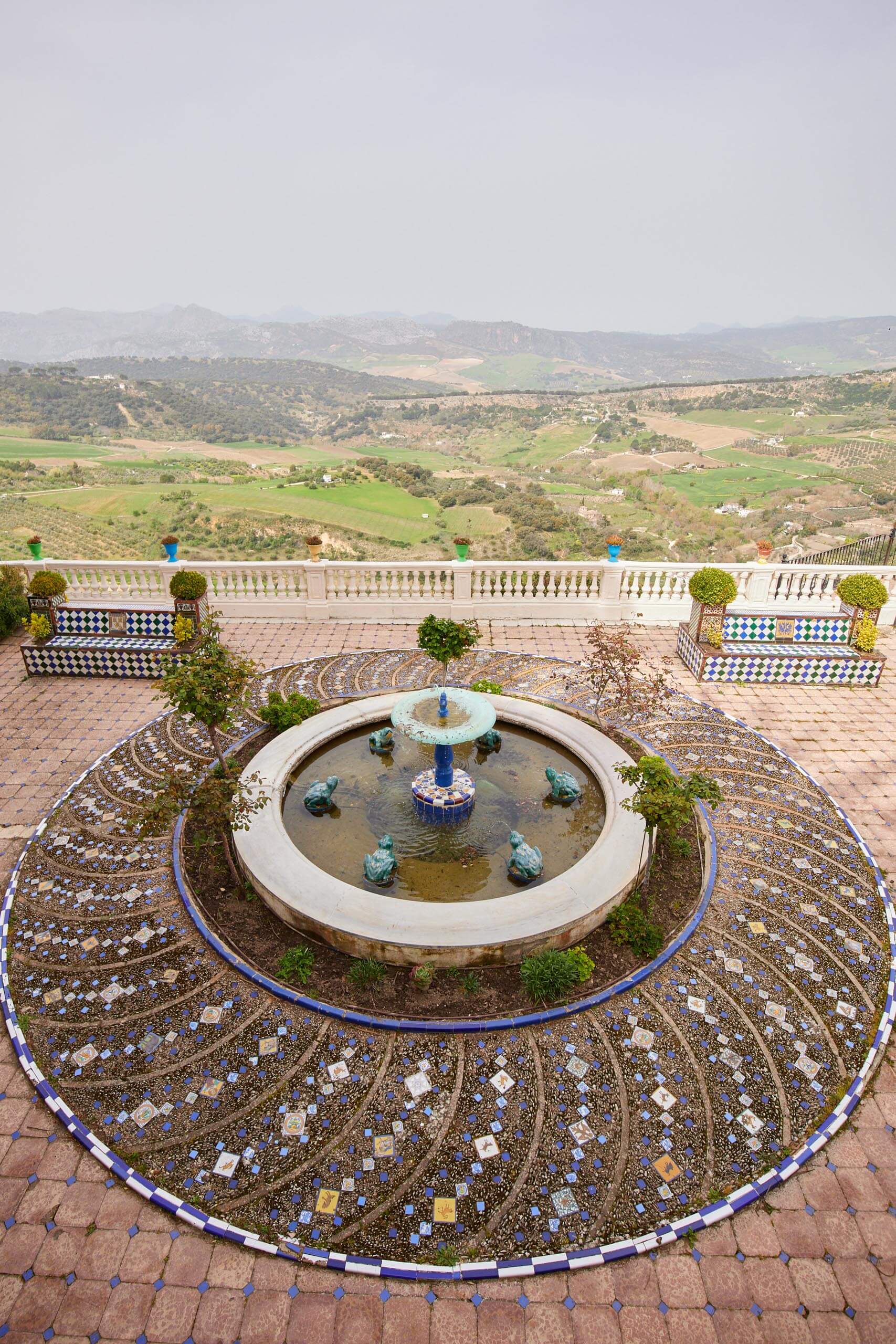 Fountain in the gardens and the Serranía de Ronda